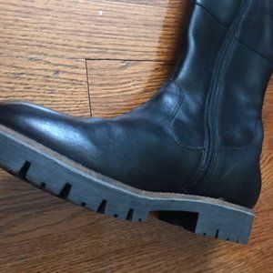 Caprice high black leather boots.